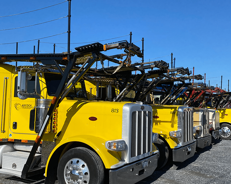 closer car carriers line up in a row